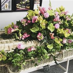 Pink and lime tropical coffin spray 