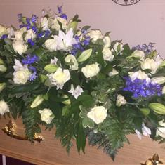 Blue and white coffin spray