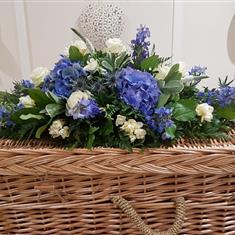 Royal blue and white coffin spray 