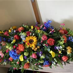 Rainbow casket spray 