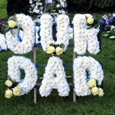 Our Dad on double tribute stand 